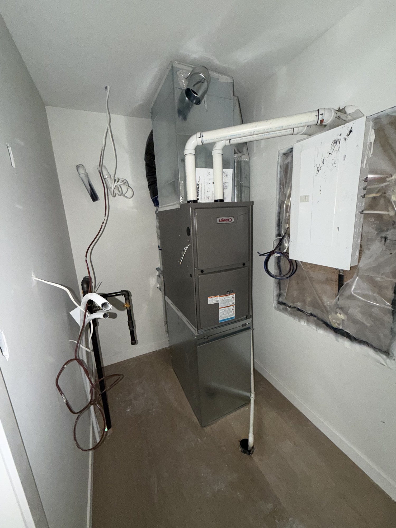 Infill garage suite duplex HVAC rough-in, Edmonton — Jasper Park side-by-side build.