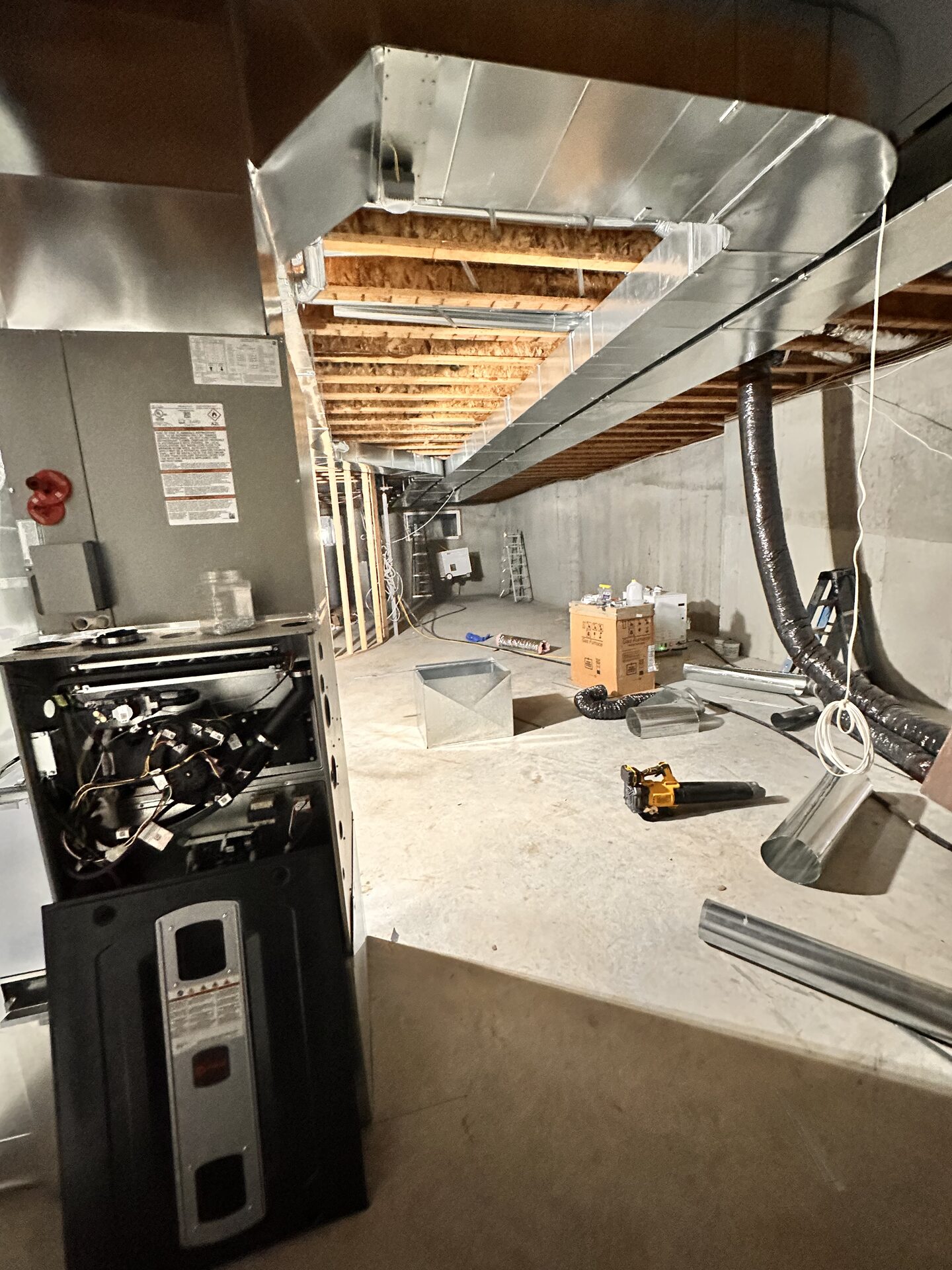 Custom infill home HVAC installation in Highlands, Edmonton — high-efficiency furnace, central A/C, and smart thermostat by City Mechanical.